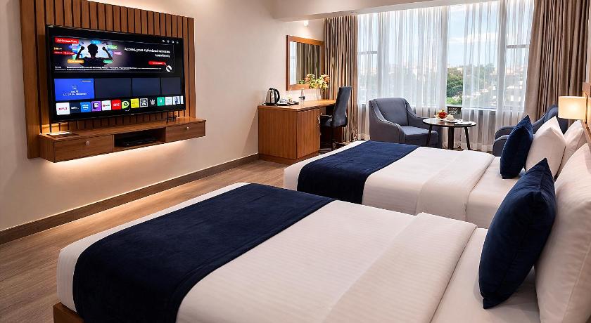 Image of Deluxe Queen Room with Two Queen Beds 0