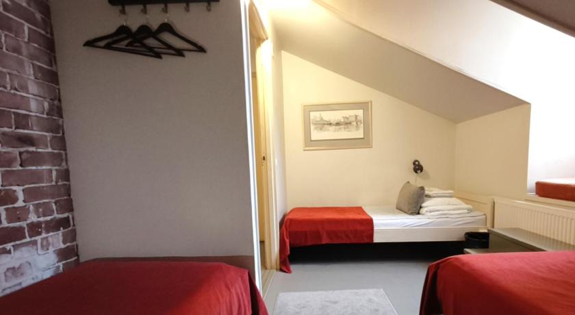 Image of Triple Room with Shared Bathroom 7