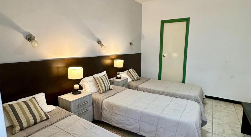 Image of Quadruple Room with Private Bathroom 1