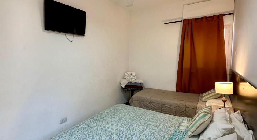Image of Triple Room with Private Bathroom 11