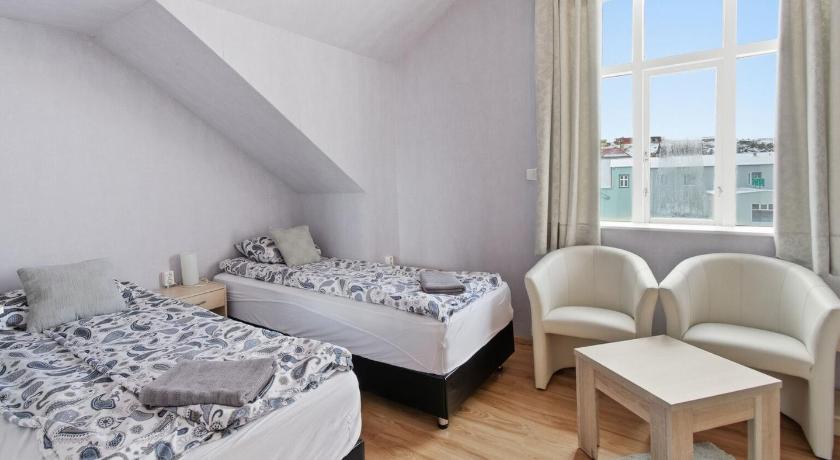 Image of Triple Room with Shared Bathroom 7