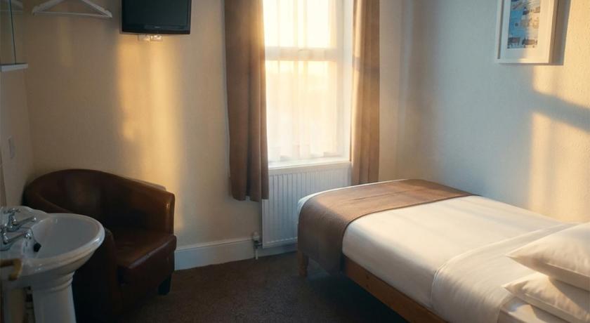 Image of Single Room with Shared Bathroom 0