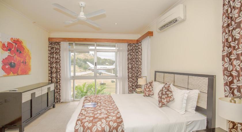 รูปของอพาร์ตเมนต์แบบสามห้องนอน (Three-Bedroom Apartment) 0