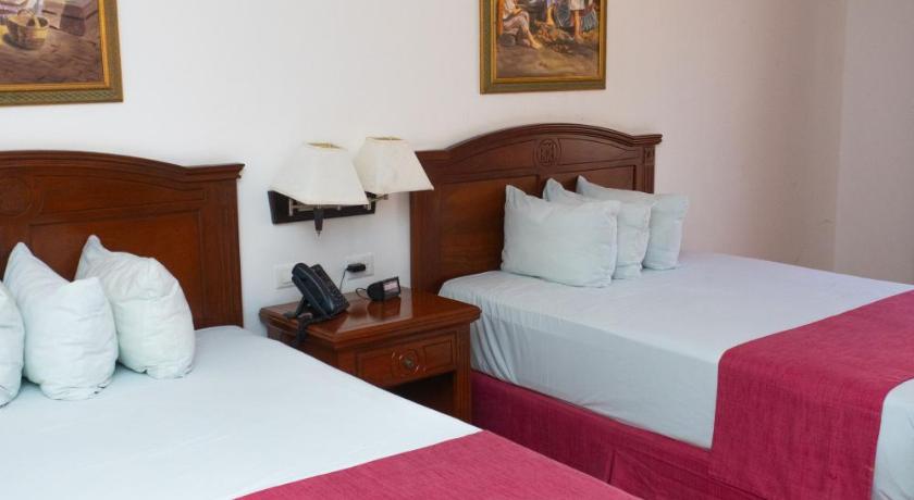 Image of Double Room with Two Double Beds 1