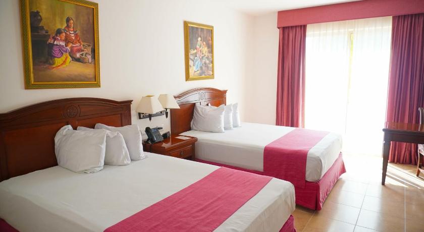 Image of Double Room with Two Double Beds 0