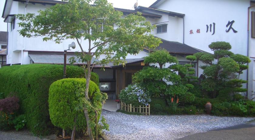 a house with a tree in front of it, Family Ryokan Kawakyu in Ibusuki