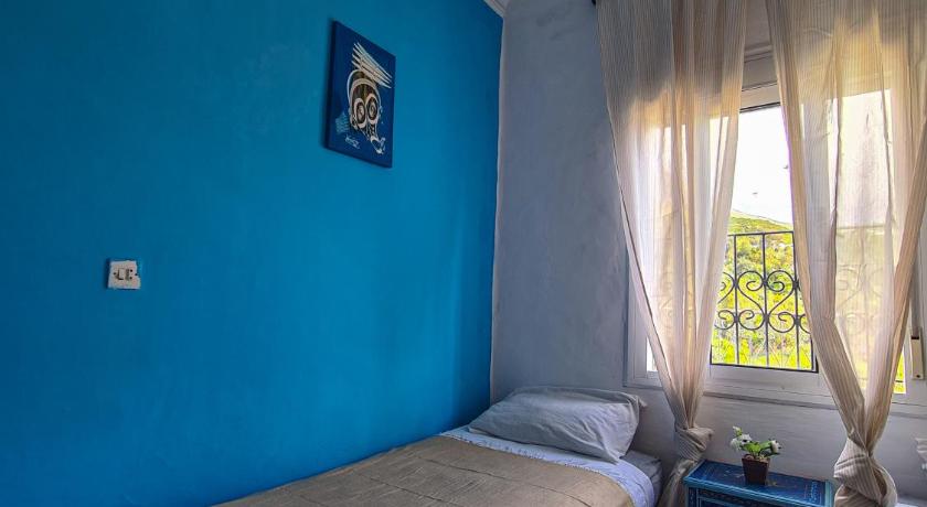Image of Triple Room with Shared Bathroom 1