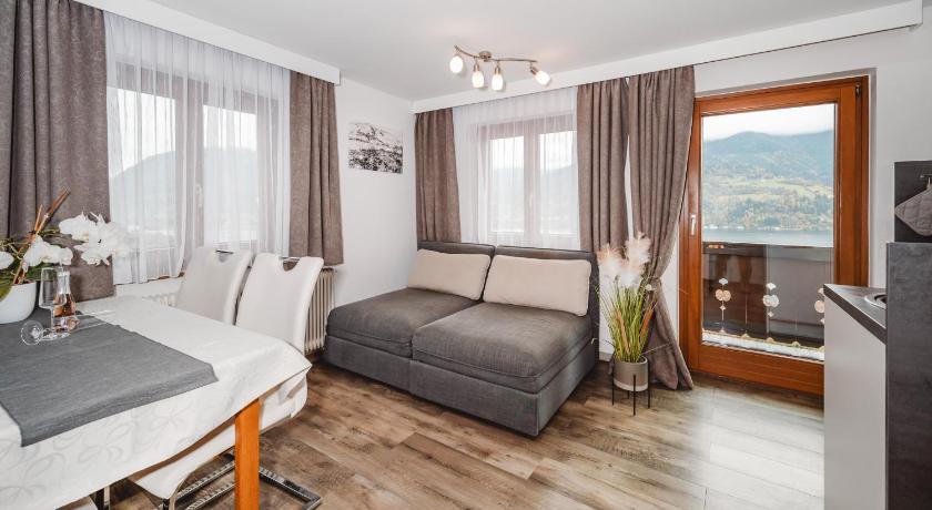 Image of One-Bedroom Apartment with Balcony and Lake View 0