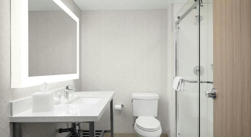 Image of One-Bedroom King Suite with Sofa Bed and Roll-In Shower - Mobility and Hearing Accessible 5
