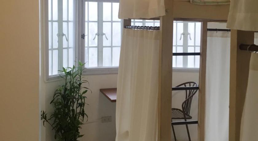 Kuva huoneesta 4 vuoteen makuusali (4-Bed Dormitory -- Mixed) 3