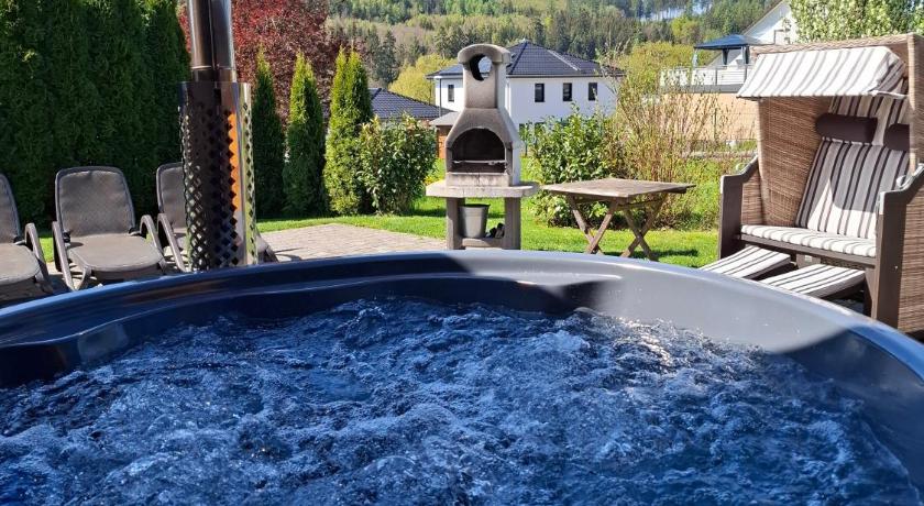 Holzhaus Zum Radekopf mit Whirlpool