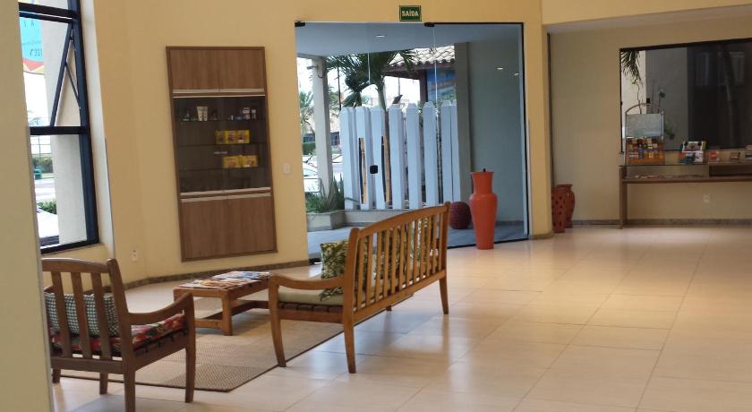 a wooden bench sitting in the middle of a hallway, Via Mar Praia Hotel in Aracaju