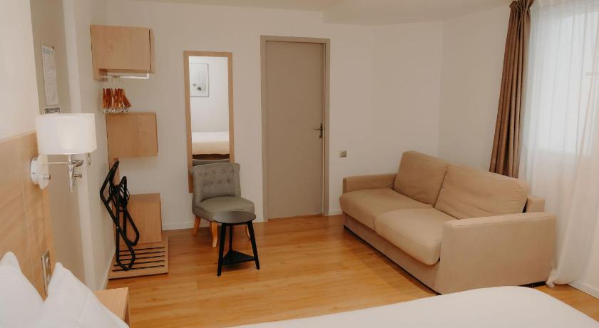 Image of Quadruple Room - 1 Double Bed 1 Double Sofa Bed 9