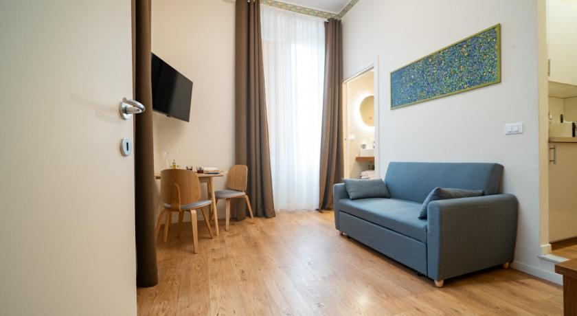 Фото: Люкс с 1 спальней (One-Bedroom Suite) 3