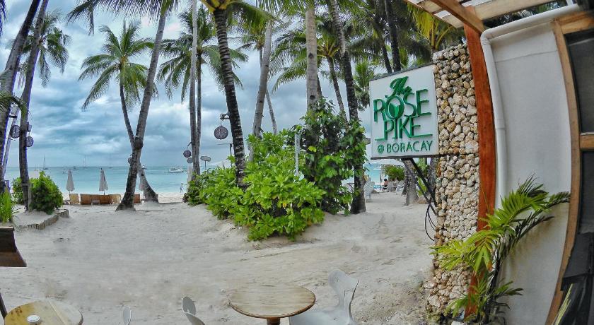 a view of a beach with palm trees and palm trees, The Rose Pike @ Boracay in Boracay Island