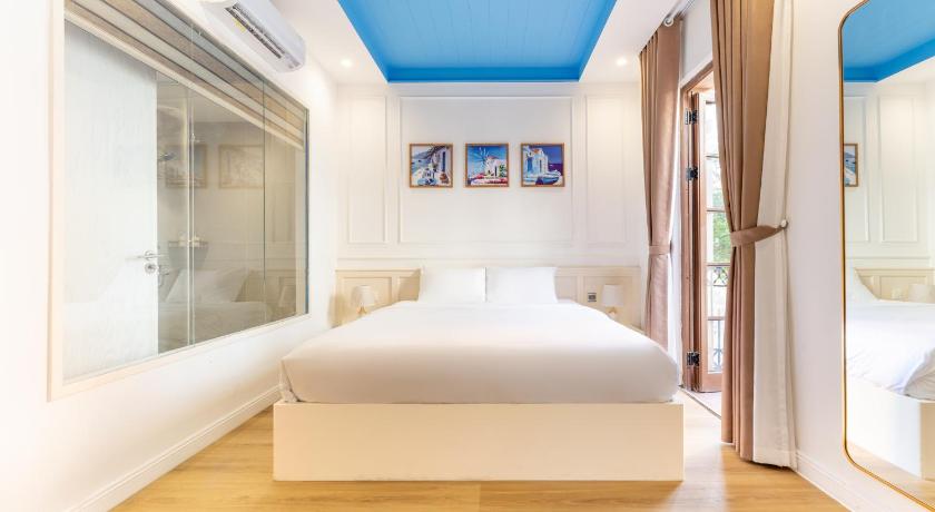 Phòng Deluxe Giường Đôi Có Ban Công (Deluxe Double Room with Balcony)tooltipPhòng Deluxe Giường Đôi Có Ban Công (Deluxe Double Room with Balcony)