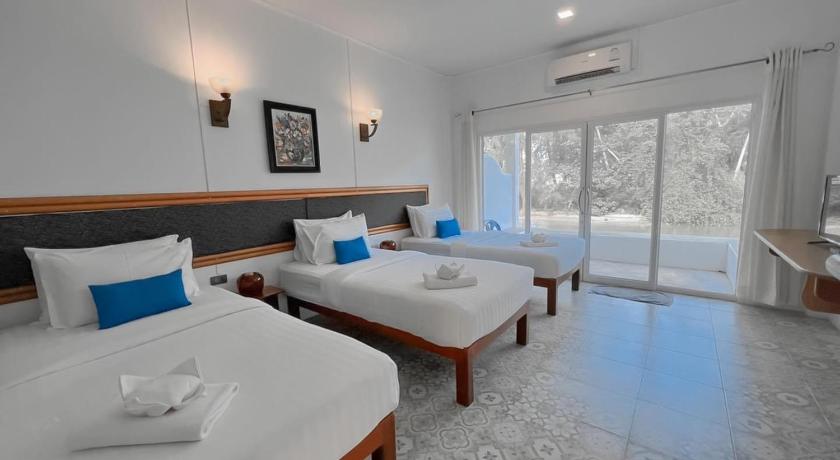 Image of Deluxe Triple Room 0
