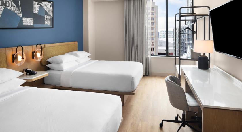 Image of Queen Room with Two Queen Beds and City View 0