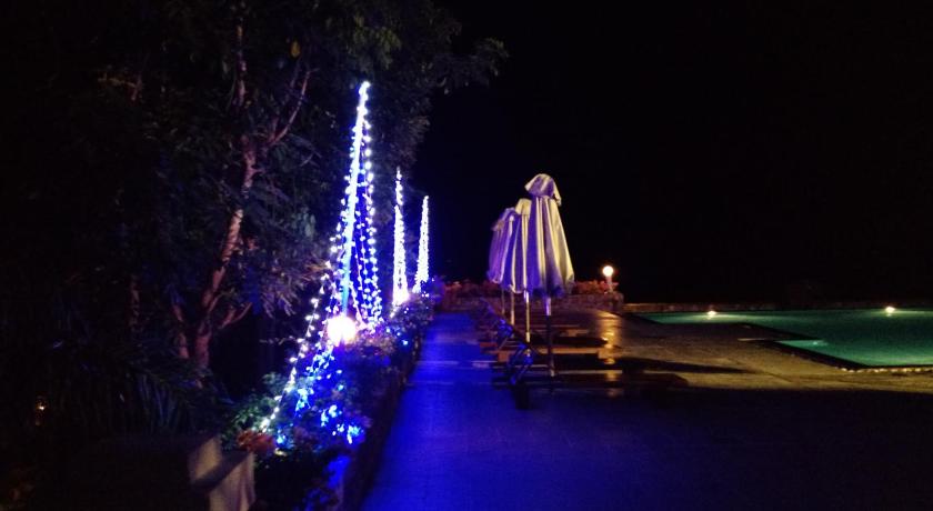 a lit up christmas tree lit up at night, Romana Resort & Spa in Phan Thiet