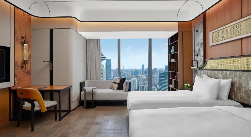 Фото: Представительский двухместный номер с 2 кроватями (Twin Executive Room) 0