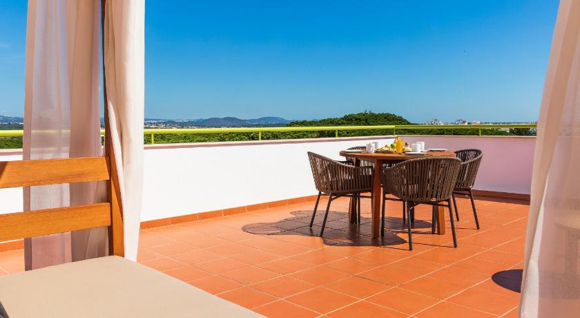 Image of Deluxe Two-Bedroom Apartment with Pool View 1