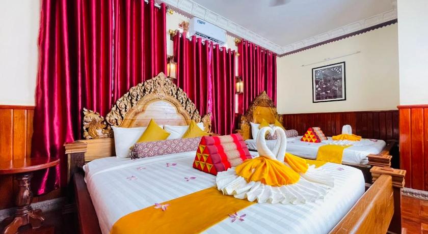 รูปของFamily Room 3 Adult ( 1 King bed - 1 Single bed ) 0
