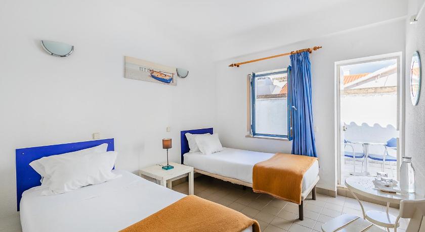 Image of Twin Room with Private Bathroom 0