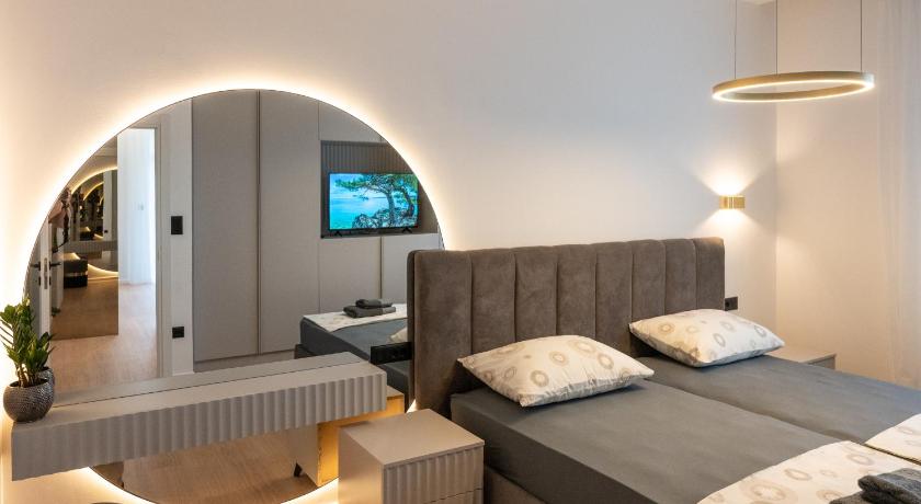 Image of Premium Three-Bedroom Apartment with Balcony 0