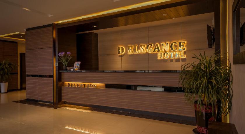 a hotel room with a sign on the wall, D Elegance Hotel in Johor Bahru