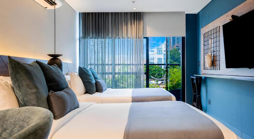รูปของห้องพักสำหรับสี่ท่านพร้อมระเบียง (Quadruple Room with Balcony) 1