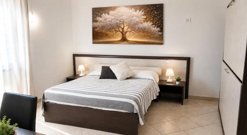 Domo - Guest-House Il Nespolo Fiorito