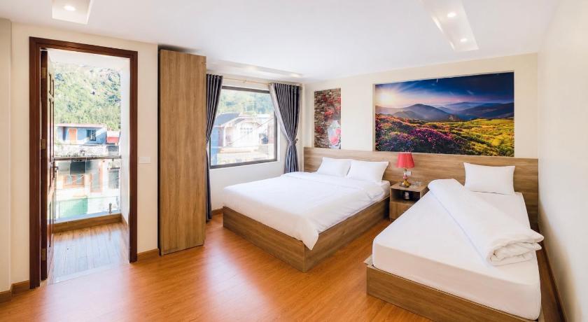 Image of Deluxe Triple Room 0