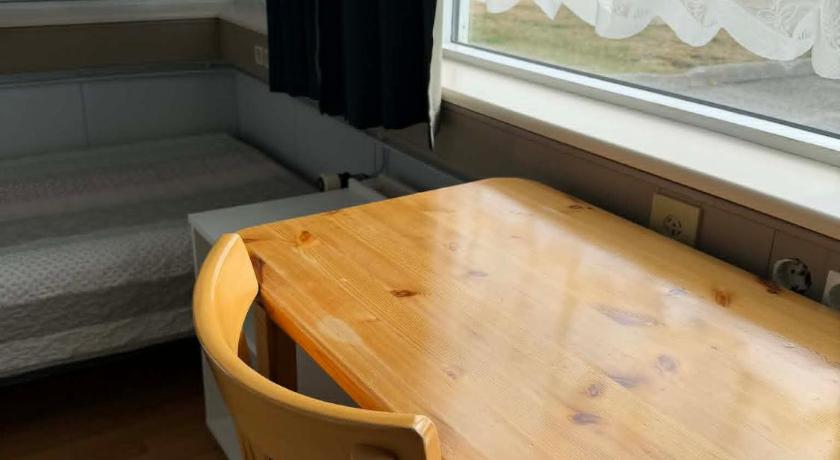 Image of Basic Triple Room with Shared Bathroom 2