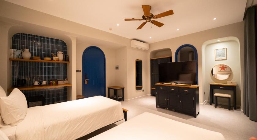 Phòng Deluxe 2 Giường Đơn Nhìn Ra Biển (Deluxe Twin Room with Sea View)tooltipPhòng Deluxe 2 Giường Đơn Nhìn Ra Biển (Deluxe Twin Room with Sea View)