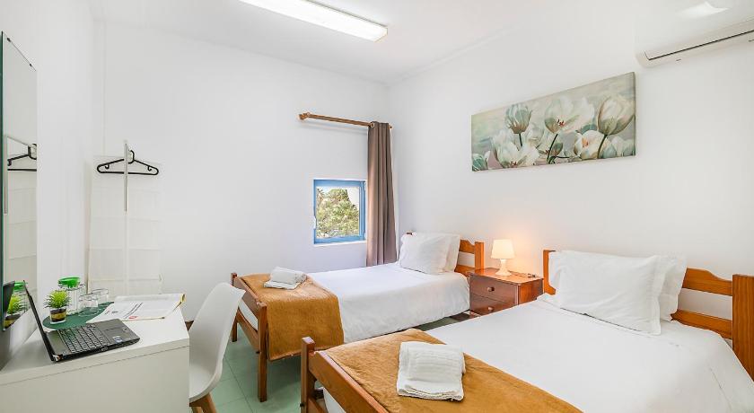 Image of Twin Room with Shared Bathroom 0