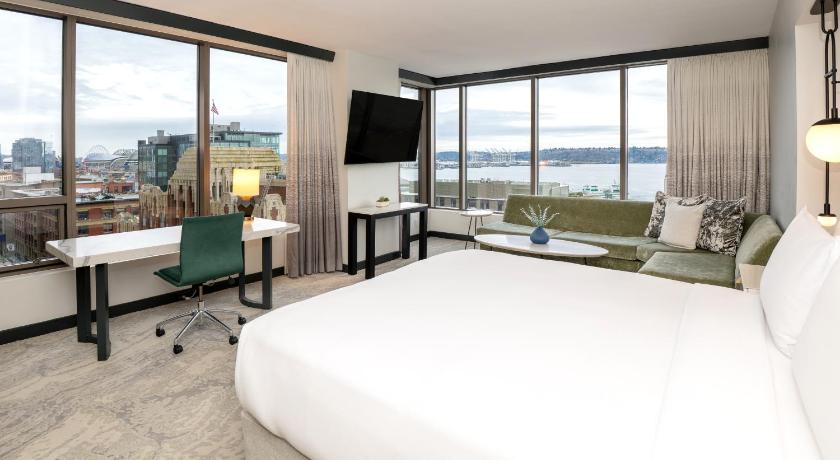 Image of 1 King Bed Water View Corner Room 0