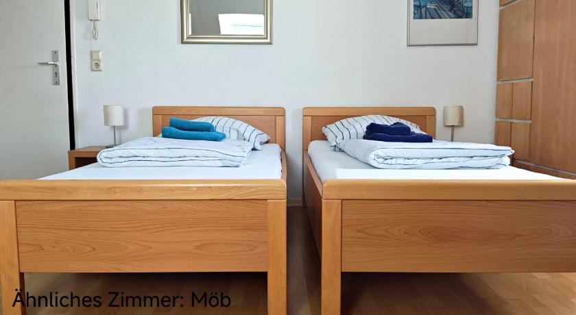Image of Twin Room with Shared Bathroom and Kitchenette 9