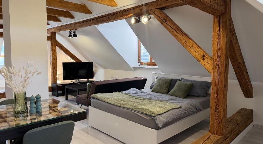 Stay in Bojnice - Charming Wooden Apartment for 4