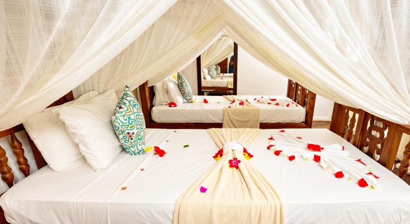 รูปของห้องสวีทเตียงแฝดพร้อมวิวทะเลบางส่วน (Partial Sea View Suite Twin) 9