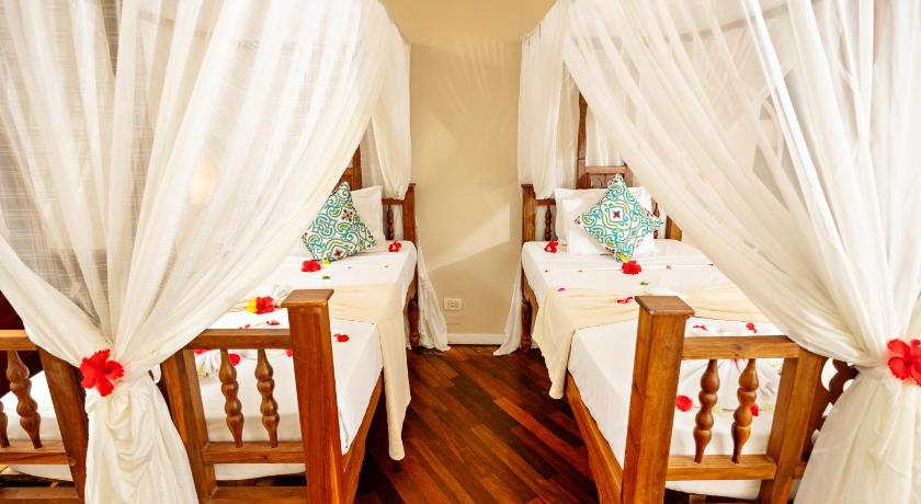 รูปของห้องสวีทเตียงแฝดพร้อมวิวทะเลบางส่วน (Partial Sea View Suite Twin) 0