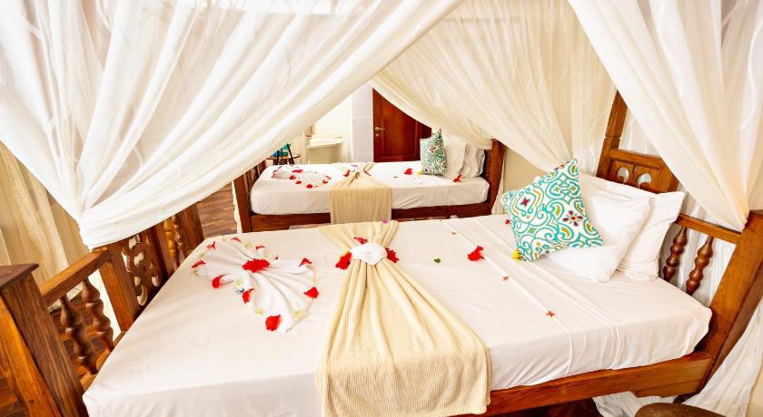 รูปของห้องสวีทเตียงแฝดพร้อมวิวทะเลบางส่วน (Partial Sea View Suite Twin) 10