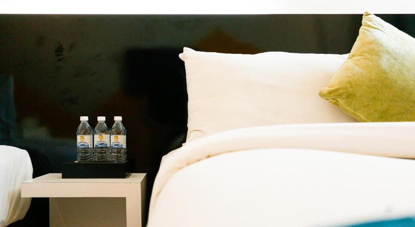 Image of Deluxe Triple Room 11