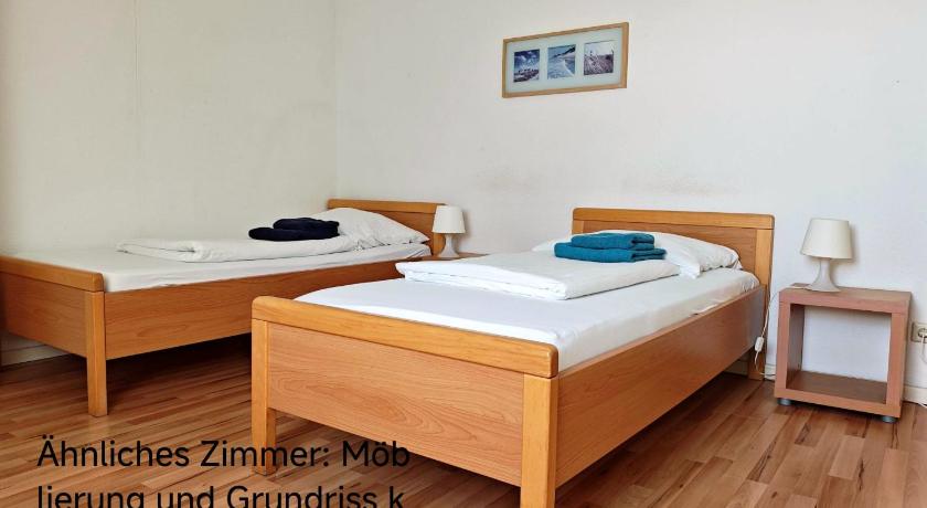Image of Twin Room with Shared Bathroom and Kitchenette 8