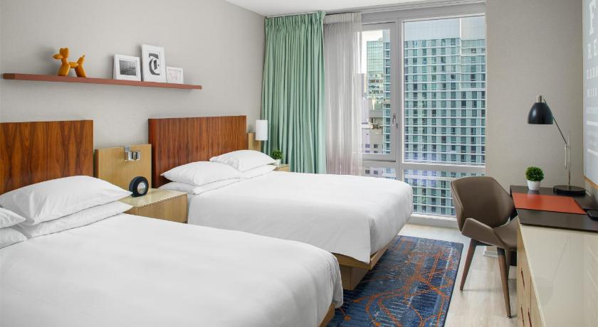 Image of 2 Queen Beds City View 1