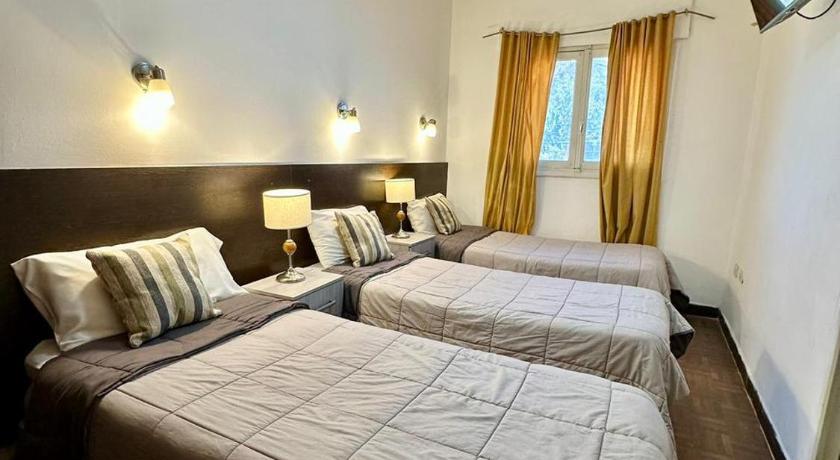Image of Triple Room with Private Bathroom 0