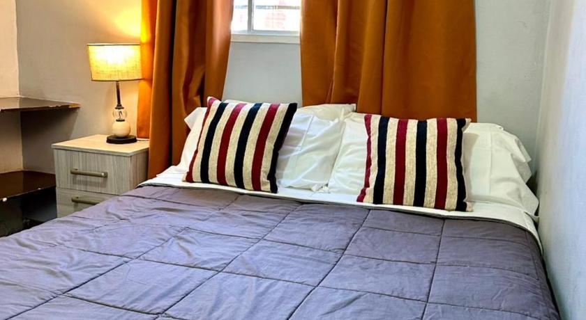 Image of Quadruple Room with Private Bathroom 6