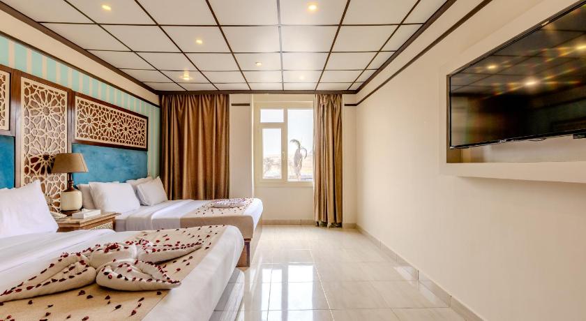 Image of Quadruple Room with Balcony 1