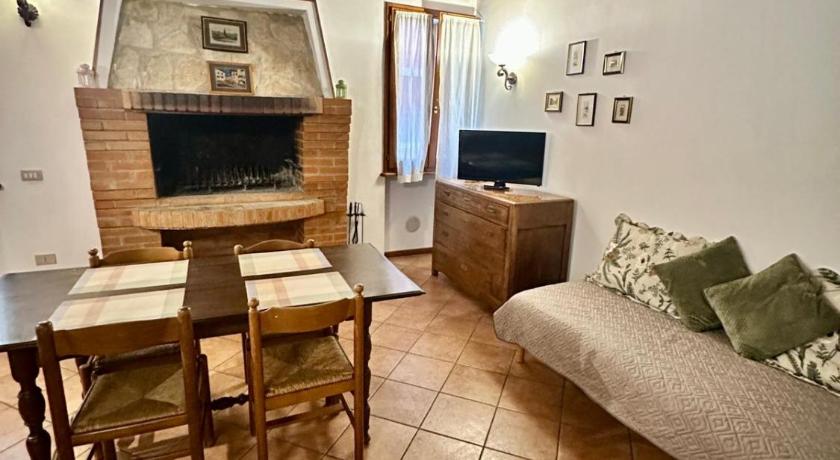 Mamisà 5, appartamento con caminetto