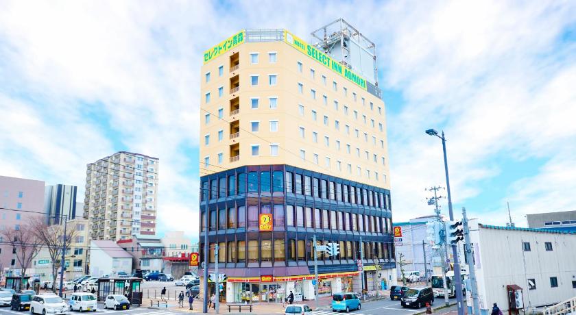 a large building with a clock on the side of it, Hotel Select Inn Aomori in Aomori