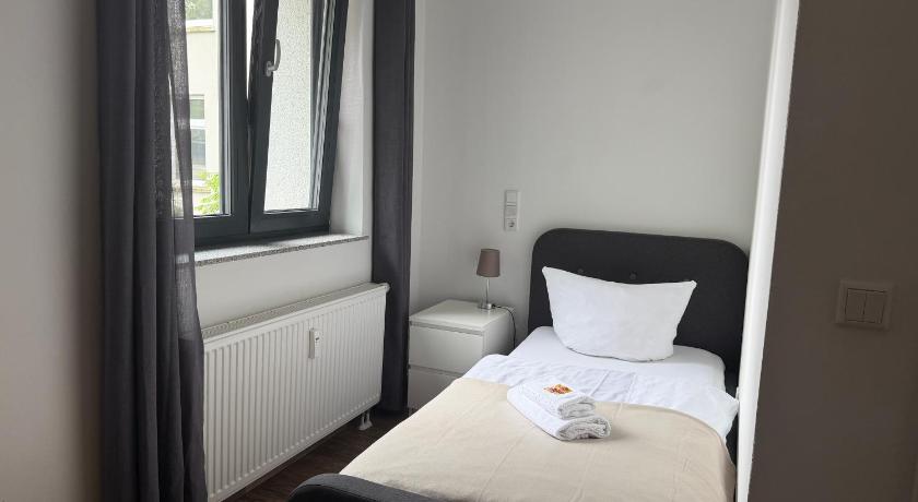 BIELEFELD CITY APARTMENTS - komfortable Einzelzimmer und Doppelzimmer - moderne Badezimmer, schnelle